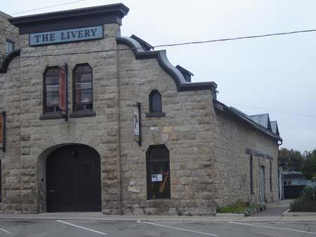 Of note are the square arched windows and massive arched entranceway.; Kayla Jonas, 2007.