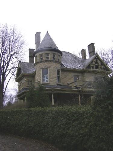 Of note are the extended veranda, side gable and chimneys.; Kayla Jonas, 2007.