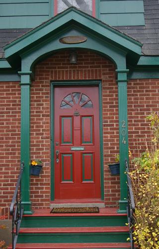 This image shows the details of the Colonial Revival portico; City of Saint John