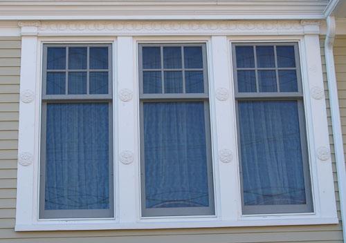 This image shows the tripartite windows on the front façade; City of Saint John