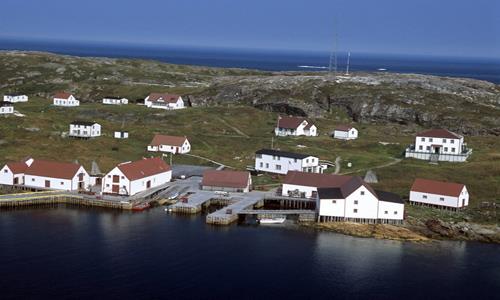 General view of Red Bay, showing the many beaches and shorelines of the harbour, and its islands that accommodated processing facilities.; Parks Canada Agency / Agence Parcs Canada.