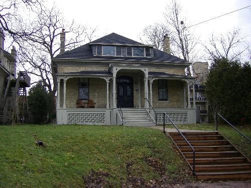 Of note is the hip roof and full veranda.; Emily Elliot, 2008.