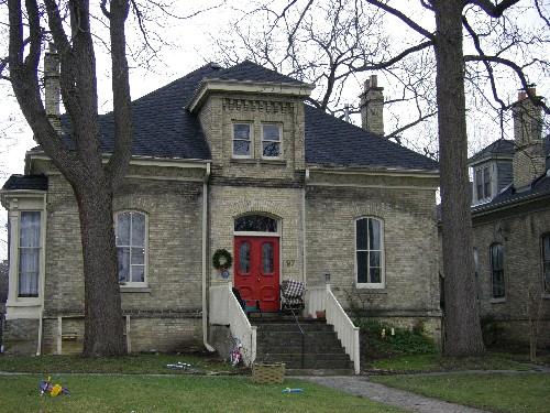 Of note is the symmetrical facade, including the central gable.; Emily Elliot, 2008.