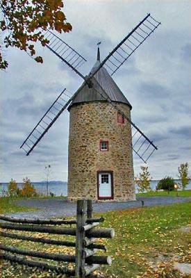 General view of the three-and-a-half storey mill at Île Perrot Windmill and Miller's House National Historic Sites of Canada, 2004.; Parks Canada Agency / Agence Parcs Canada, 2004.