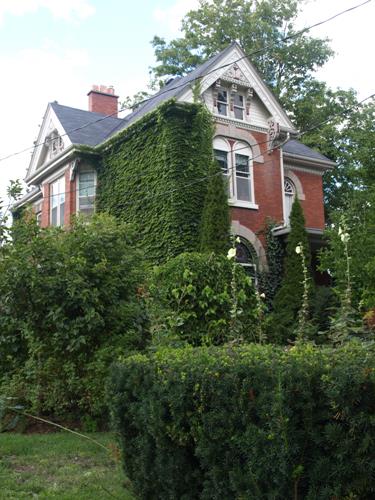 Of note are the steeply pitched multiple rooflines.; Kayla Jonas, 2008.