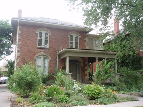 Of note are the arched lintels over the curved top double windows.; Paul Dubniak, 2008.