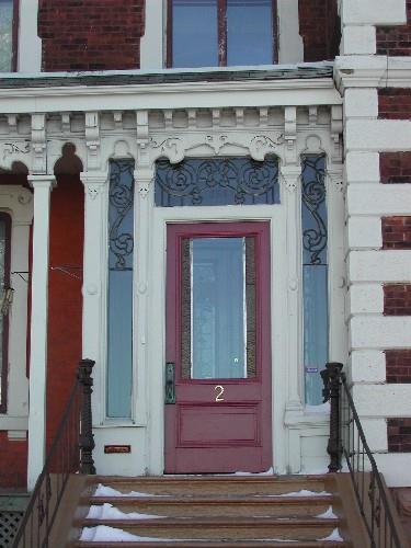 This photograph shows the elevated entrance to the building; City of Saint John