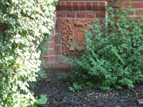 Featured is the raised terra cotta panel below the ground floor window of the facade.; Beatrice Tam, 2008.
