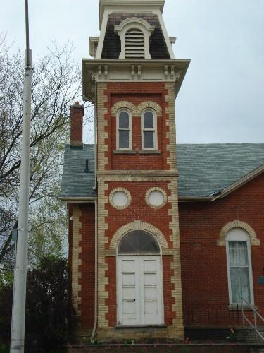 Featured is the Italianate tower with its paired brackets, paired windows and quoins.; Paul Dubniak, 2008.
