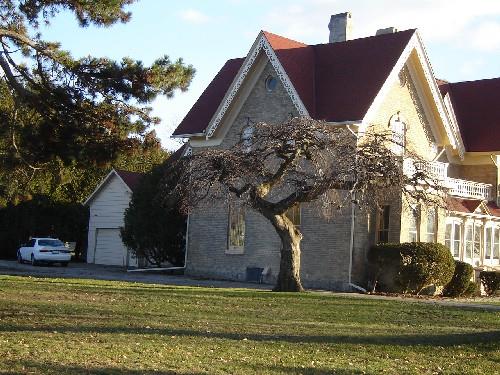 Of note is one of the three cross gables.; Kayla Jonas, 2007.