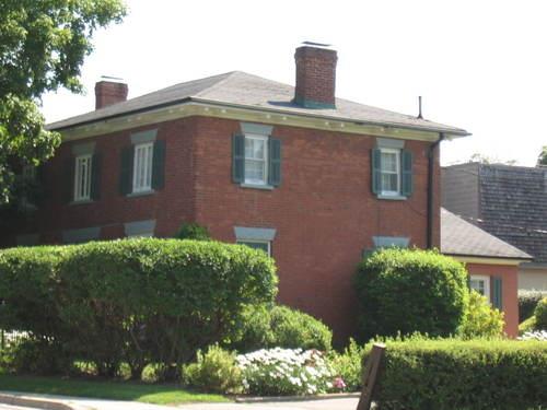 Featured is the low pitched hip roof.; Beatrice Tam, 2008.