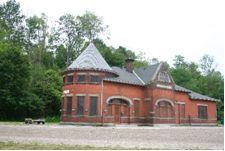 Of note are the hip roof and central gable.; Chris Mahood, Ministry of Culture, 2006.
