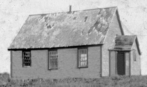Upper Gullies United Church, circa 1935. Some of the church's foundation stones are still visible at Upper Gullies United Church Cemetery, Upper, Gullies, Conception Bay South, NL. Photo taken circa 1935. ; Upper Gullies United Church Cemetery Committee 2009 