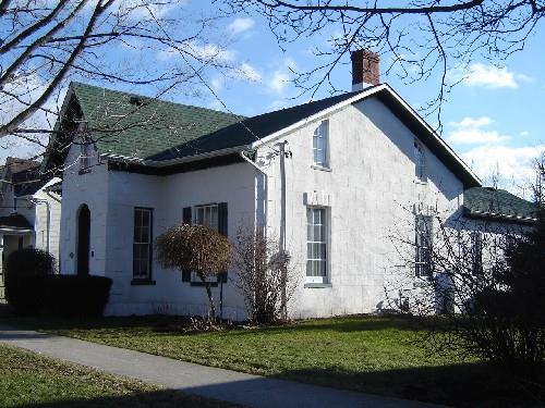 Of note are the brick chimney and half gothic windows.; Kayla Jonas, 2007.