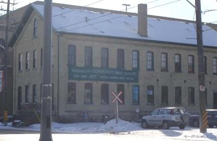 View of the north elevation of the Button Factory depicting the segmentally arched windows, 2007.; Kayla Jonas, 2007.