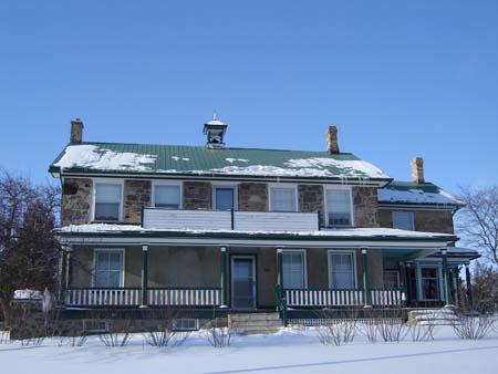 South facing façade, featuring five bay front on the second storey, 2007.; Lindsay Benjamin, 2007.