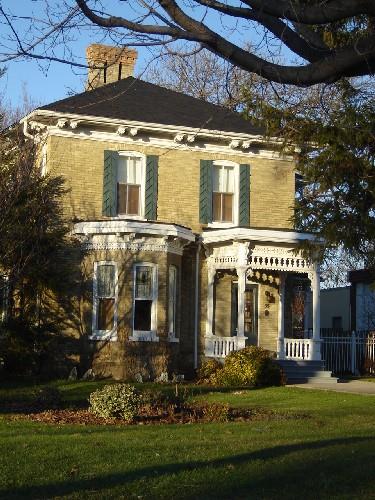 Of note are the low hip roof, wide cornice and paired brackets.; Kayla Jonas, 2008.