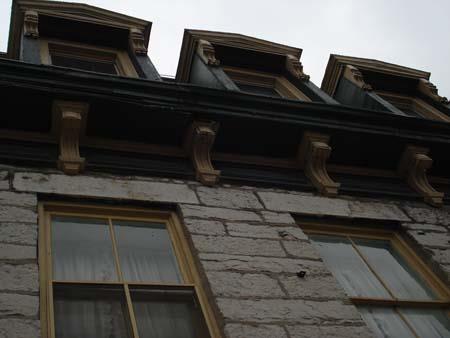 Of note are the two over two windows, wooden cornice, brackets, and dormer windows.; Martina Braunstein, 2007.
