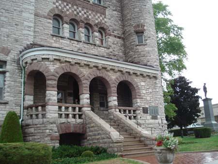Featured is the multi arched portico entrance with contrasting stone work and balustrade.; Martina Braunstein, 2007.