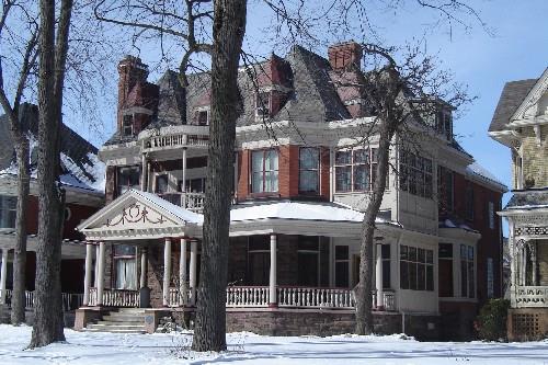 Of note is the rock faced red sandstone foundation, and spindles and balustrades on verandas.; Paul Dubniak, 2008.