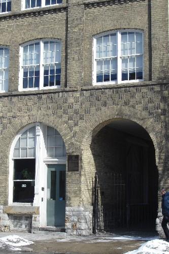 Featured are the vehicular and pedestrian entrances to the building.; Paul Dubniak, 2008.