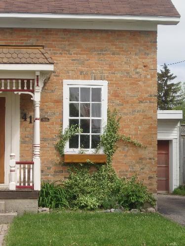 Featured is a six over six paned window.; Chelsey Tyers, 2008.