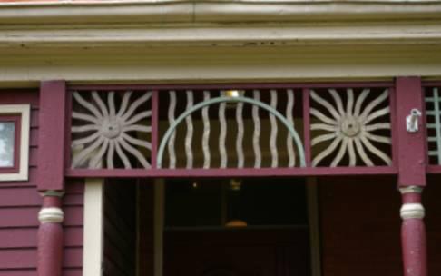 This photograph illustrates the decorative spindle work of the veranda, 2007; City of Saint John