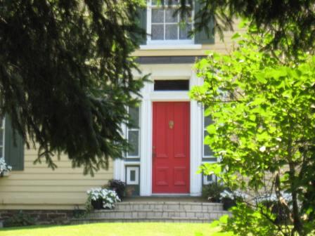 Featured is the central entrance with sidelights and coloured glass transom.; Beatrice Tam, 2008.