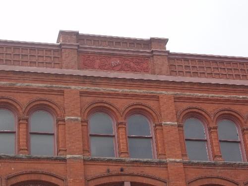 Of note is the headstone bearing the date 1895 set in elaborately carved stonework.; Chelsey Tyers, 2008.