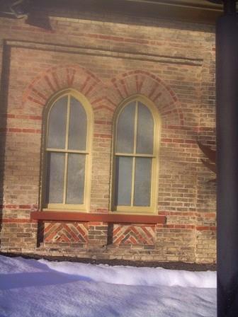 Featured are the paired two over two, double hung windows.; Paul Dubniak, 2008.