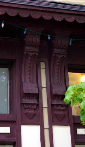 This image shows the ornamental brackets supporting entrance entablature; City of Saint John, 2008