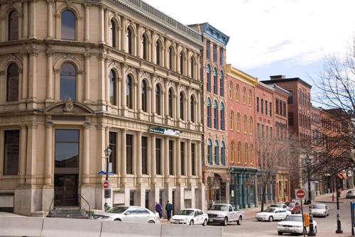 This image shows the building in its context along Prince William Street.; Commercial Properties Limited