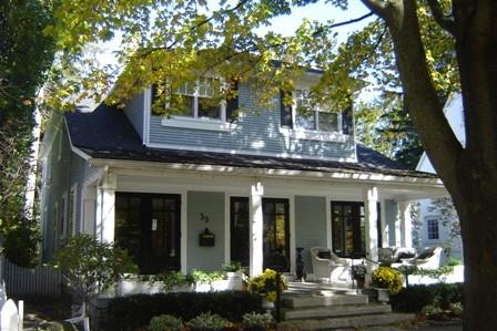 Featured is a Shingle style cottage.; Kayla Jonas, 2008.