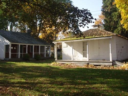Of note is the porch with overhanging roof.; Martha Fallis, 2008.