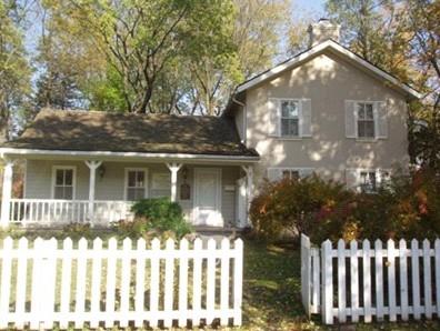 Of note are the double hung windows with shutters.; Martha Fallis, 2008.