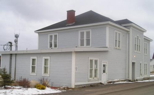 View of the street-facing facade of Fogo Courthouse and Public Building, Fogo, NL. Photo taken 2009. ; Town of Fogo 2009