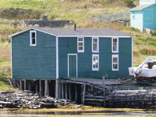 View of the left and front facades of Burrage’s Stage, New Perlican, NL. Photo taken 2009. ; HFNL/Andrea O'Brien 2009