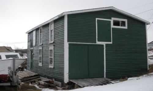View of the front and right facades of Burrage’s Stage, New Perlican, NL. Photo taken 2009. ; HFNL/Andrea O'Brien 2009
