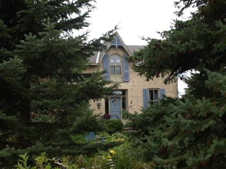 Of note is the central entrance with transom and sidelights.; Kayla Jonas, 2008.