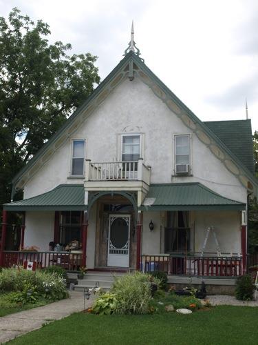 Of note is the veranda with green curved roof.; Kayla Jonas, 2008.