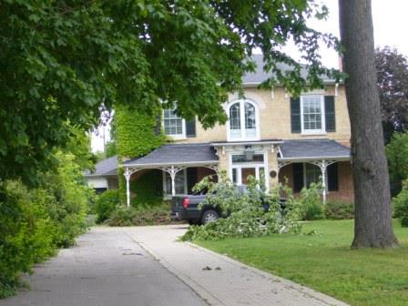 Of note is the veranda with stylized supports.; Kirsten Pries, 2008.
