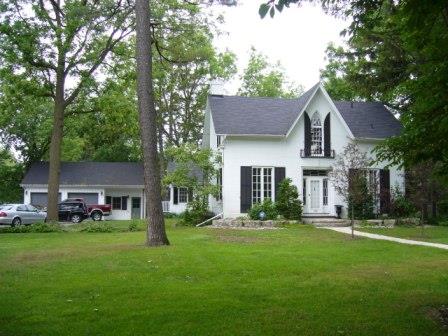 Of note are the two French Regency floor length casement windows.; Kirsten Pries, 2008.