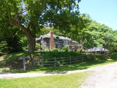 Of note is the two storey log exterior.; Kirsten Pries, 2008.
