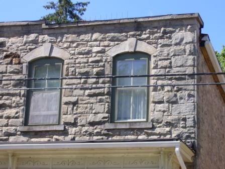 Of note are the two over two sash windows with keystones.; Kirsten Pries, 2008.