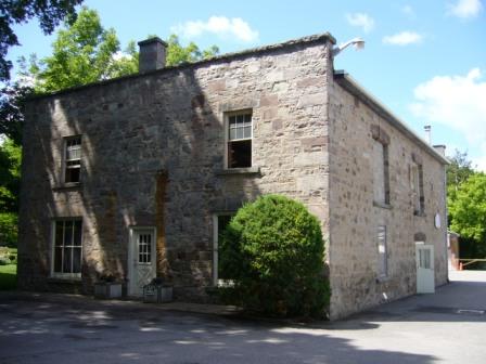 Of note is the stone exterior of one of the Mill buildings.; Kirsten Pries, 2008.