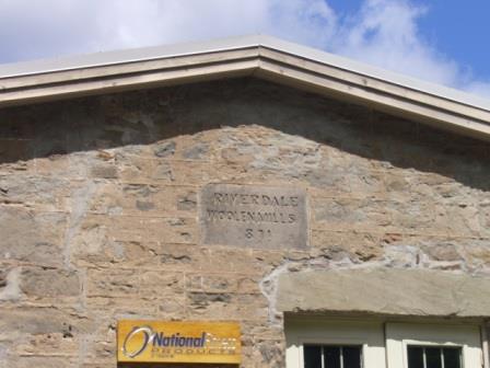 Featured is the signage that dates construction to 1871 and shows current use of building.; Kirsten Pries, 2008.