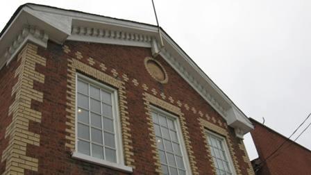 Of note is the dentil trim on the gable ends.; Chelsey Tyers, 2008.