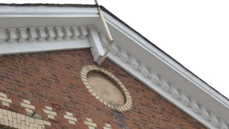 Of note are the quoins and the use of yellow brick for the decorative details.; Chelsey Tyers, 2008.