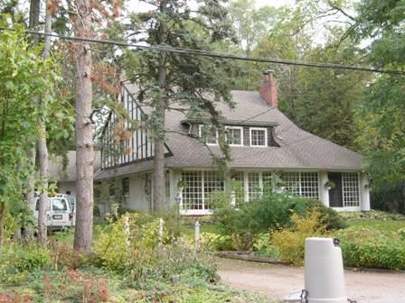 Of note is the steeply pitched gable roof and vertical half-timbering.; Paul Dubniak, 2009.