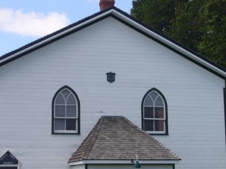 Of note are the small lancet windows on the facade.; Kirsten Pries, 2008.